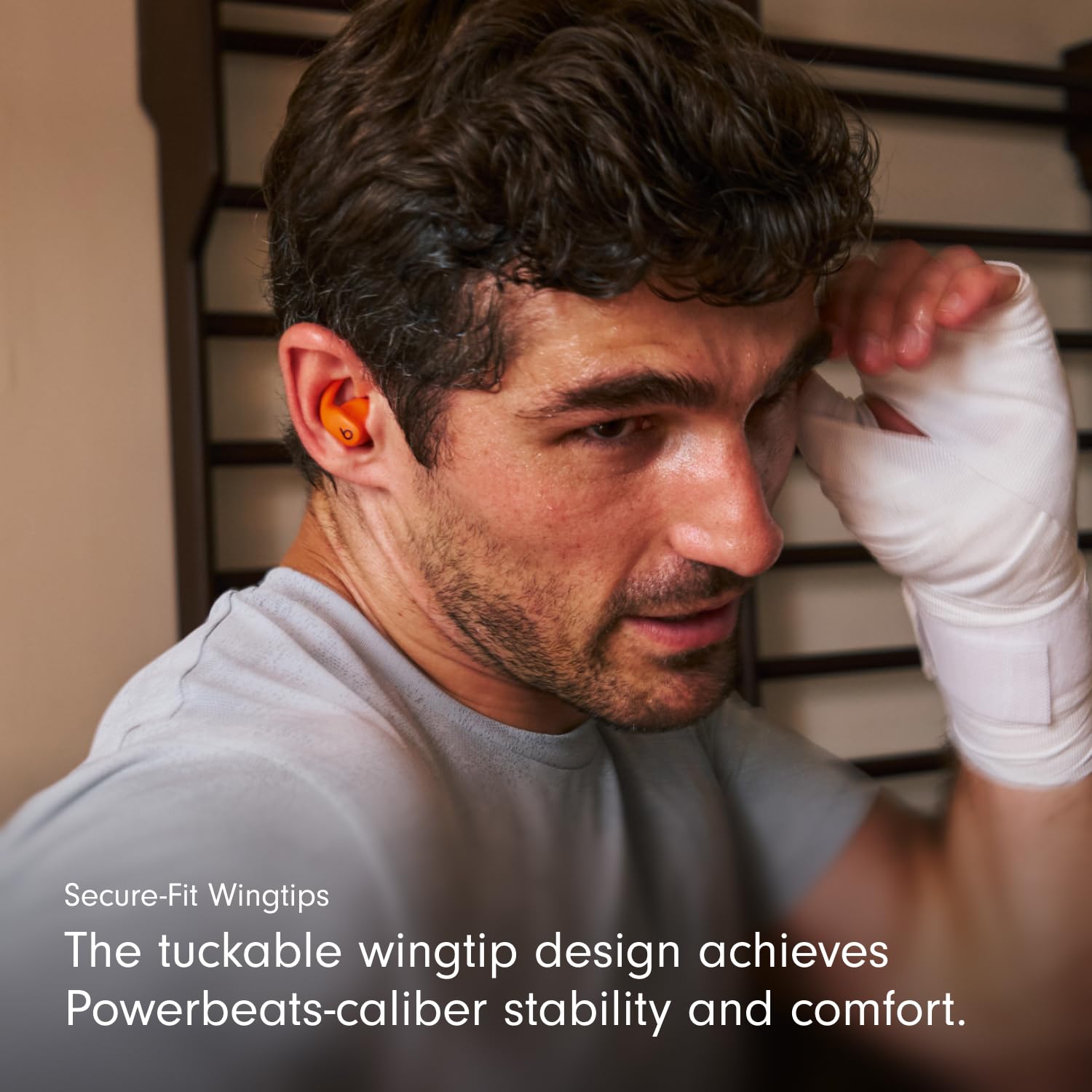 Beats Powerbeats Fit - Wireless Noise Cancelling Workout Earbuds with Secure-Fit Wingtips, Up to 30-Hour Battery Life, Sweat & Water Resistant, Apple & Android Compatible - Spark Orange